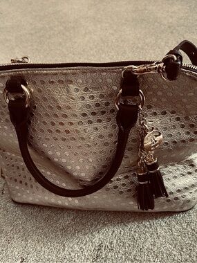 Designer inspired NWOT metallic Dome Satchel  handbag with Tassel Charm.